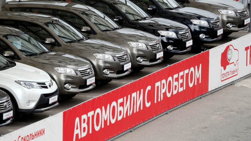 As Russia salaries war, cars and truck sales plunge as well as Putin looks for a repair